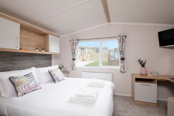 Please note: All imagery shown is a representation only. Style, decor and exact views vary by lodge 