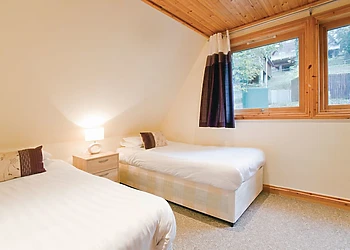 Typical Deluxe Woodland Lodge Four