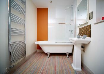 En-suite Bathroom with shower over bath 
