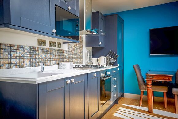 Fully appointed kitchen with dining area 