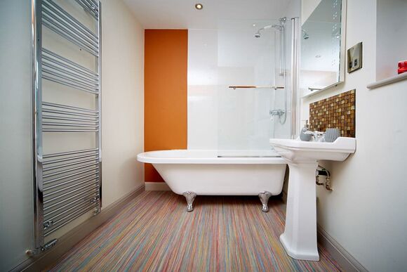 En-suite Bathroom with shower over bath 