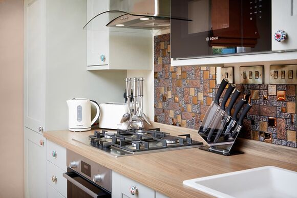 Fully equipped kitchen within the open-plan design 