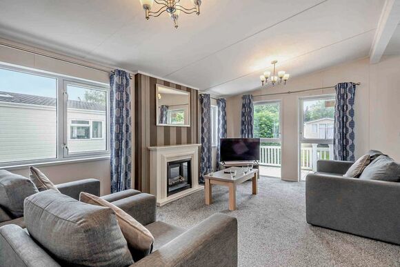 Deluxe 2 Bedroom Lodge, Sleeps 4. Parking, ensuite, deck and sea view - Brynowen, Aberystwyth, Cardiganshire