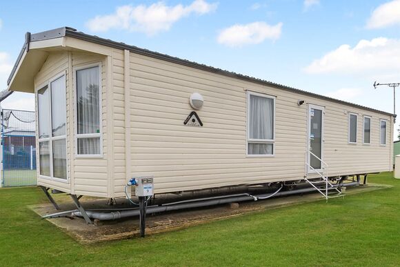 Gold Caravan with parking & decking - Coopers Beach, Mersea Island, Colchester