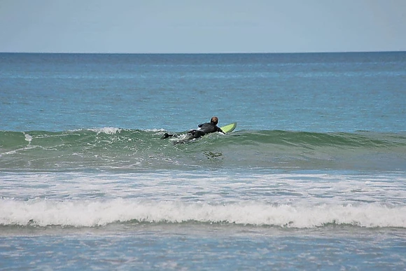 Surfing at Pease Bay