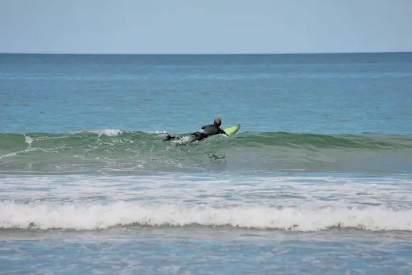 Surfing at Pease Bay