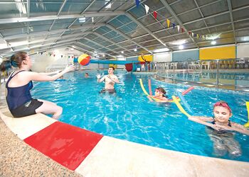 Indoor heated swimming pool with waterslide