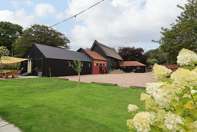 Halcyon Barn near Halesworth sleeps eight, and every bedroom has its own en suite