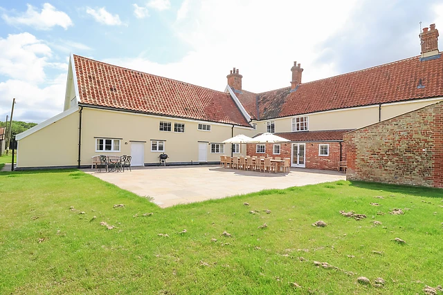 This Grade II listed farmhouse at Sibton sleeps 16 and has a wood-fired tub and sauna for the group