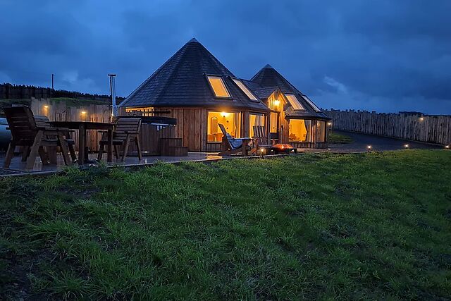 Ty Crwn is a Celtic-style roundhouse for two with a wood-fired hot tub and a fire pit