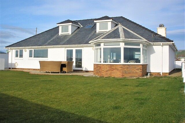The Gables in Tywyn sleeps eight and is about 0.1 miles from the beach