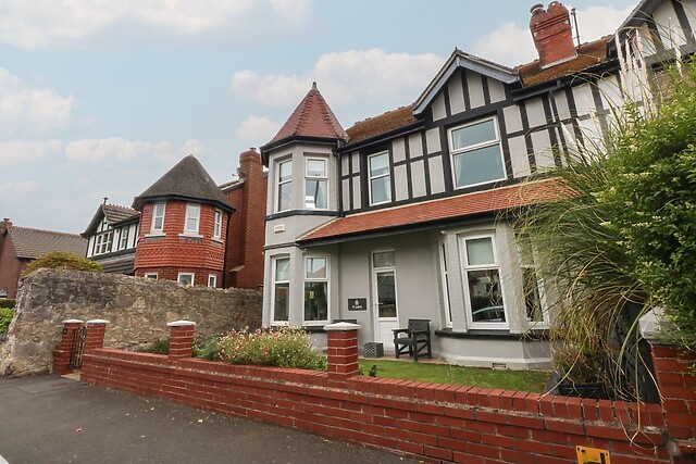Ty Llwyd sleeps eight, takes three dogs and is half a mile from the beach in Llandudno
