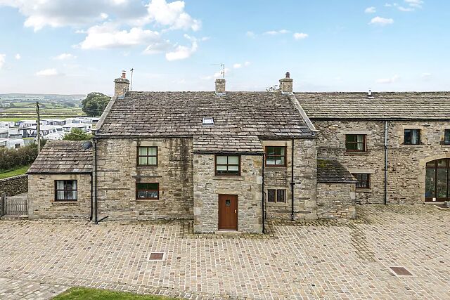 Orcaber Farmhouse sits on the edge of Austwick, about 5 miles from Settle in the Dales
