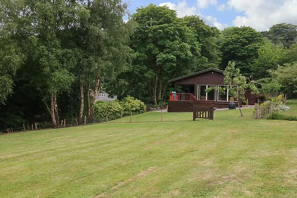 Kipling Lodge is an all-timber log cabin with its own access to Rudyard Lake