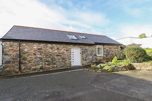 Bryn Eglwys Barn is a barn conversion for two on a working farm near Tywyn